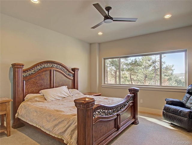 bedroom with ceiling fan and carpet