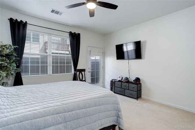 3993 S Dillon Way Unit 104, Aurora, CO 80014 - bedroom featuring carpet floors, ceiling fan, and baseboards