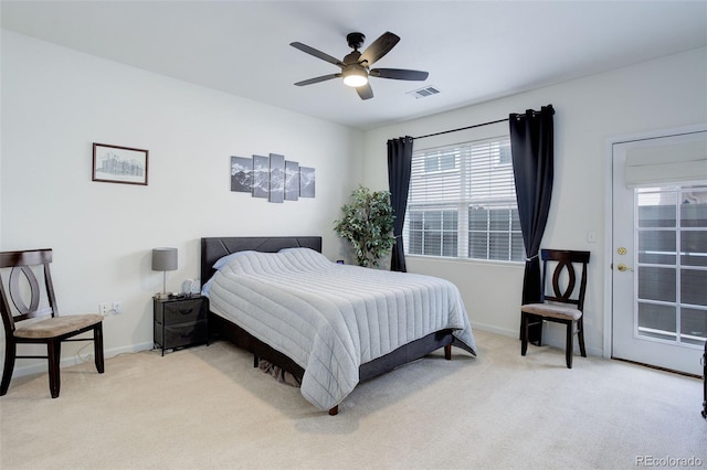 3993 S Dillon Way Unit 104, Aurora, CO 80014 - bedroom with light carpet, baseboards, ceiling fan, and access to outside