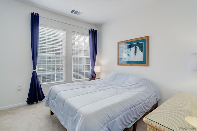 3993 S Dillon Way Unit 104, Aurora, CO 80014 - carpeted bedroom with baseboards