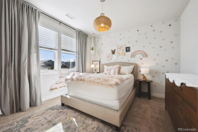 carpeted bedroom featuring baseboards, visible vents, and wallpapered walls