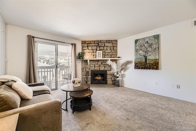 living room with carpet floors, a fireplace, and visible vents