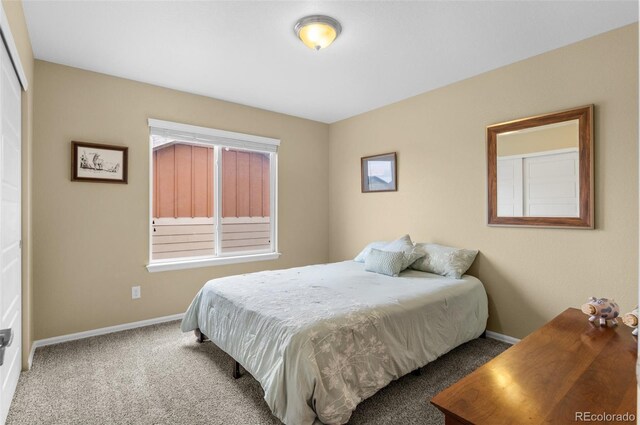 16685 E 101st Ave, Commerce City, CO 80022 - carpeted bedroom featuring baseboards and a closet
