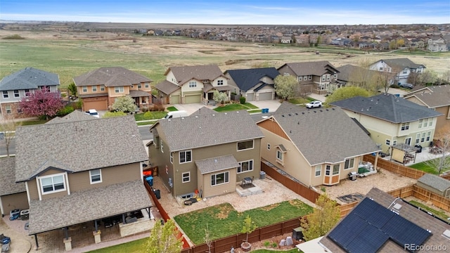 16685 E 101st Ave, Commerce City, CO 80022 - drone / aerial view featuring a residential view