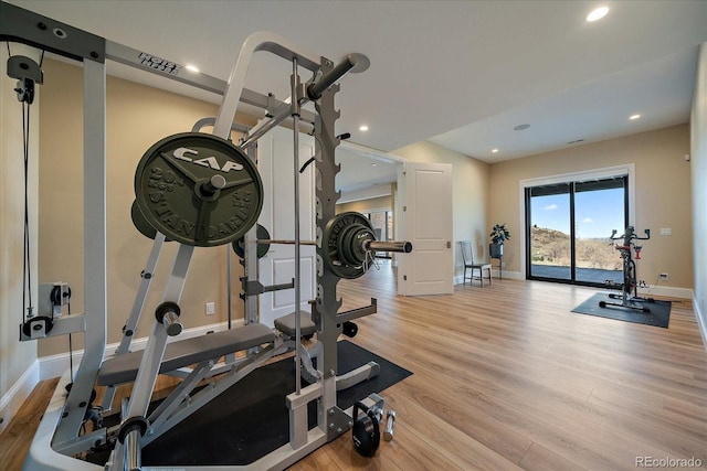 5254 Creation Rock Trl, Morrison, CO 80465 - exercise room featuring recessed lighting, baseboards, and wood finished floors