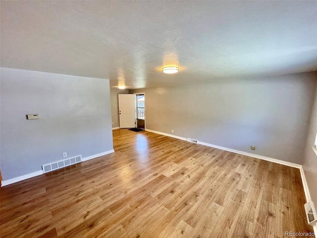 9600 W 18th Dr Unit 9610, Lakewood, CO 80215 - spare room with wood finished floors and baseboards