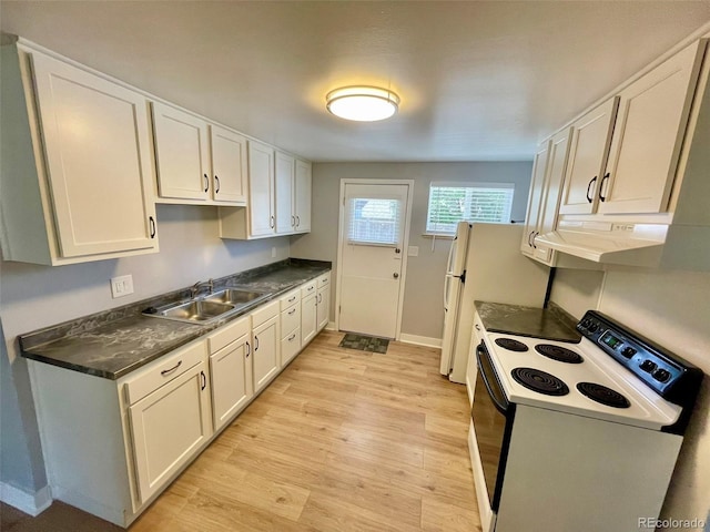 9600 W 18th Dr Unit 9610, Lakewood, CO 80215 - kitchen with white appliances, light wood-style floors, under cabinet range hood, and white cabinets