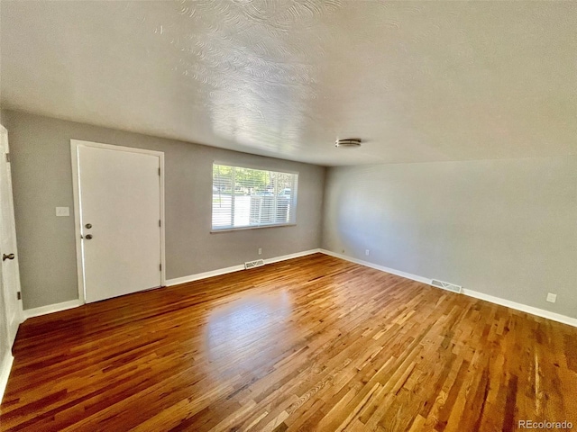 9600 W 18th Dr Unit 9610, Lakewood, CO 80215 - empty room with wood finished floors