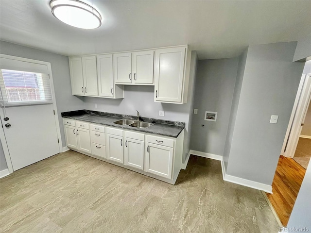 9600 W 18th Dr Unit 9610, Lakewood, CO 80215 - kitchen with dark countertops and white cabinets