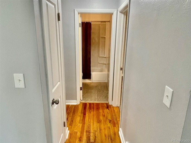 9600 W 18th Dr Unit 9610, Lakewood, CO 80215 - hall featuring wood finished floors and baseboards