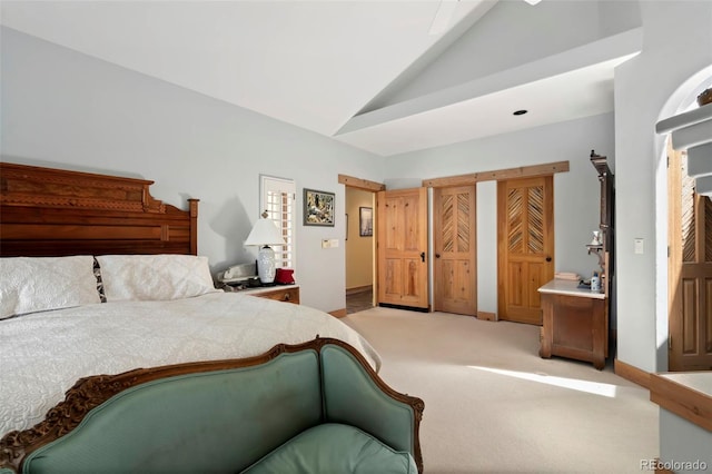 2611 Fox Acres Dr E, Red Feather Lakes, CO 80545 - bedroom with vaulted ceiling, carpet flooring, and baseboards