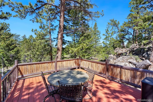 2611 Fox Acres Dr E, Red Feather Lakes, CO 80545 - deck with outdoor dining area