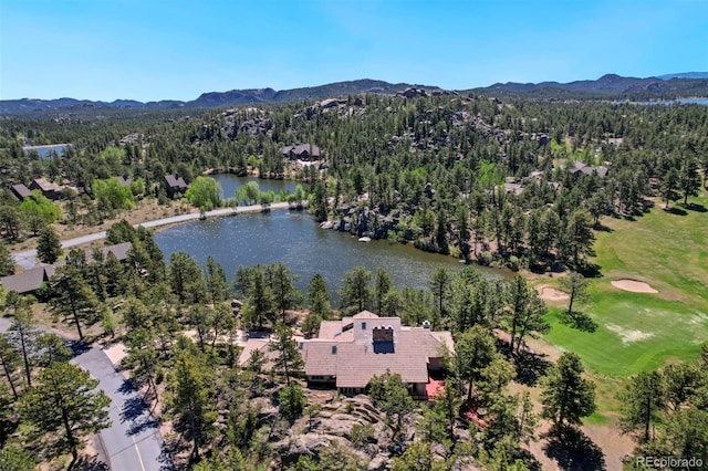 2611 Fox Acres Dr E, Red Feather Lakes, CO 80545 - drone / aerial view of a water and mountain view, a forest, and a golf club