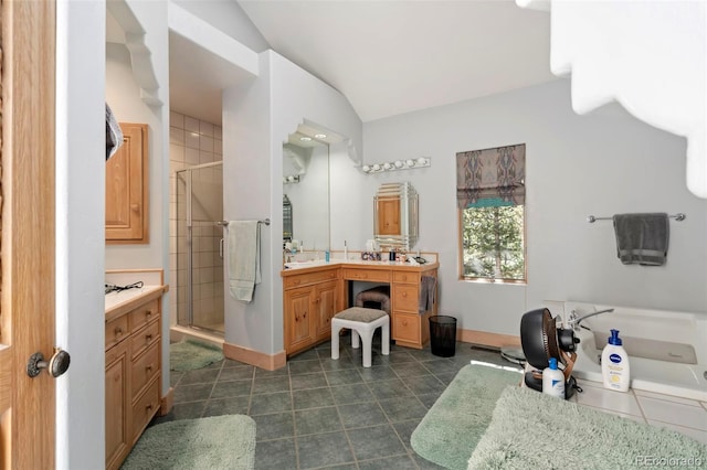 2611 Fox Acres Dr E, Red Feather Lakes, CO 80545 - bathroom featuring vanity, a stall shower, vaulted ceiling, tile patterned flooring, and baseboards