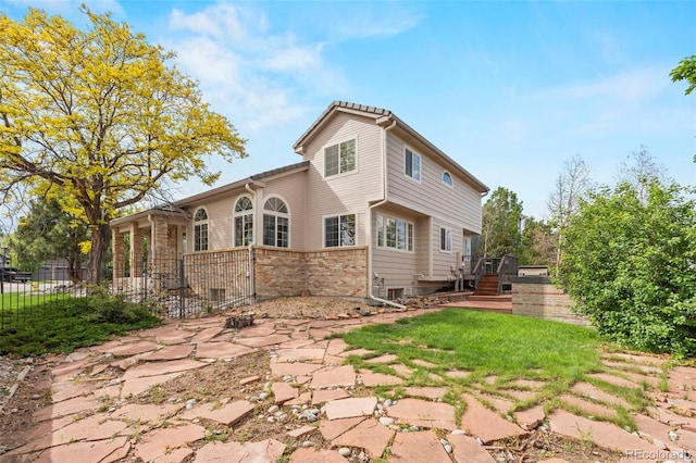 9432 La Quinta Way, Lone Tree, CO 80124 - back of house featuring brick siding