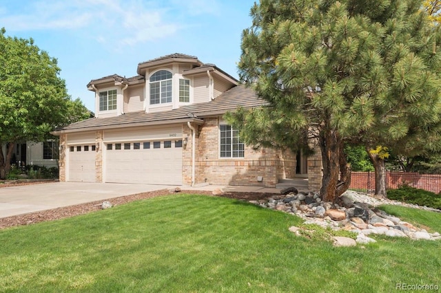 9432 La Quinta Way, Lone Tree, CO 80124 - view of front of home with concrete driveway, a tiled roof, a garage, and brick siding