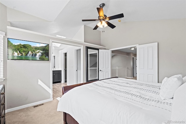 9432 La Quinta Way, Lone Tree, CO 80124 - bedroom with light colored carpet, high vaulted ceiling, ensuite bath, and a ceiling fan
