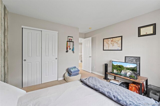 9432 La Quinta Way, Lone Tree, CO 80124 - carpeted bedroom featuring a closet and baseboards
