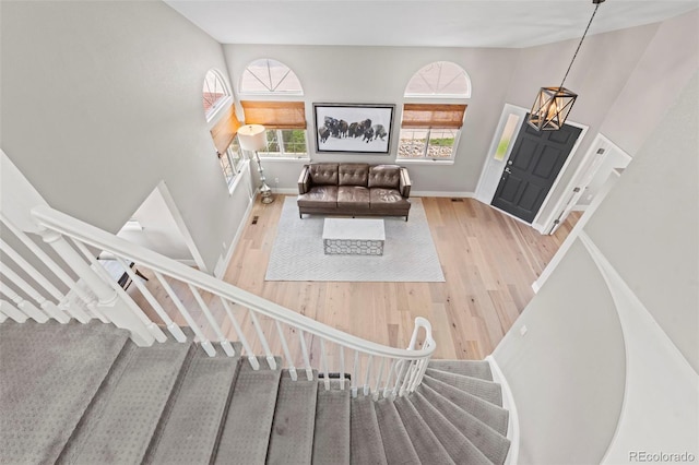 9432 La Quinta Way, Lone Tree, CO 80124 - foyer with wood finished floors, stairway, and a towering ceiling
