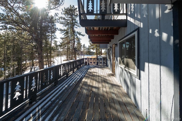 view of snow covered deck