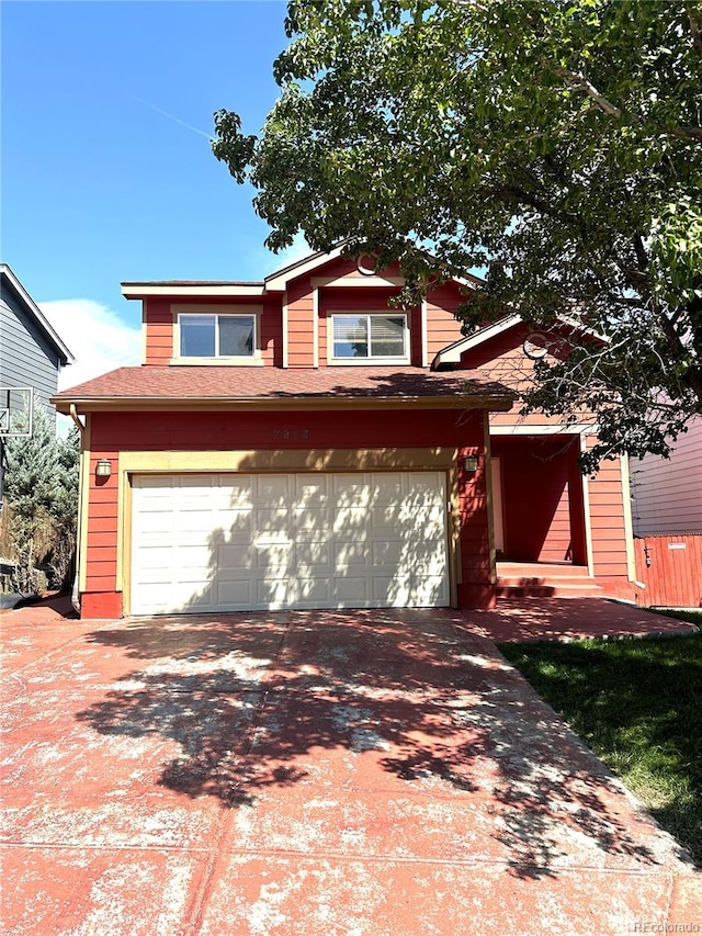 view of front of property featuring a garage