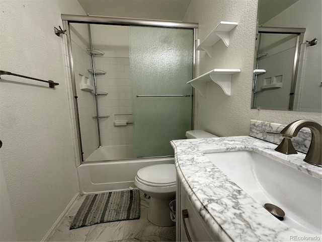 full bathroom with shower / bath combination with glass door, vanity, and toilet