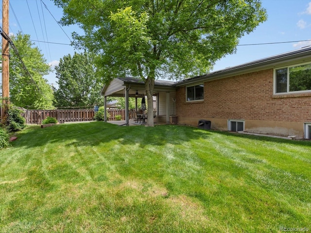 945 Emerald St, Broomfield, CO 80020 - view of yard with a patio area