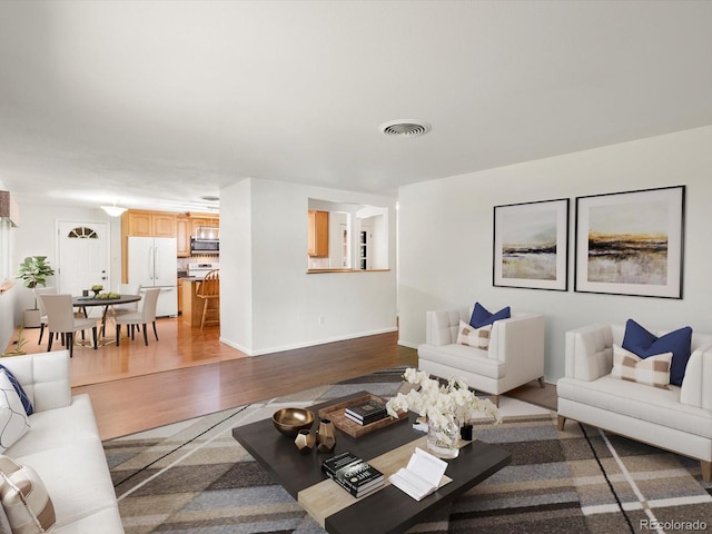 945 Emerald St, Broomfield, CO 80020 - living room with wood finished floors and baseboards