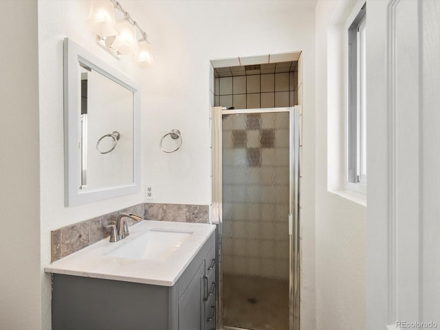 945 Emerald St, Broomfield, CO 80020 - bathroom featuring vanity and a stall shower