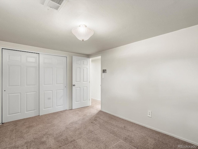 945 Emerald St, Broomfield, CO 80020 - unfurnished bedroom featuring carpet flooring, a closet, and baseboards