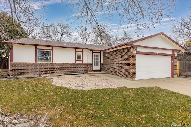 single story home featuring a garage and a front yard