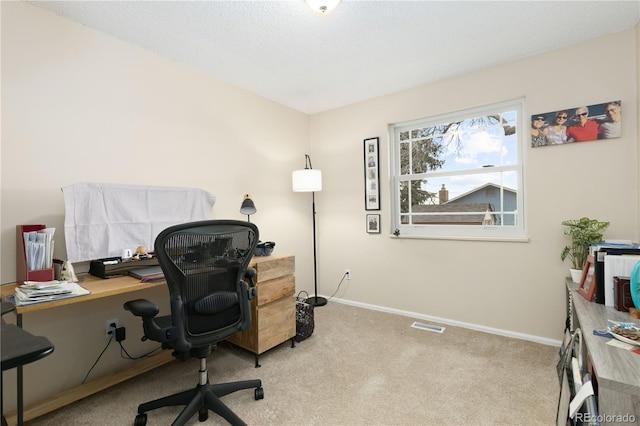 home office with light colored carpet