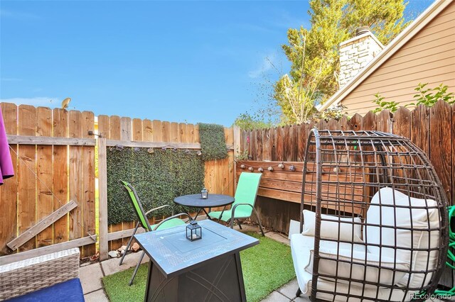 view of patio with fence