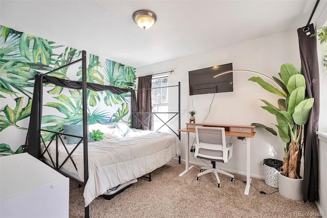 bedroom featuring carpet flooring and baseboards