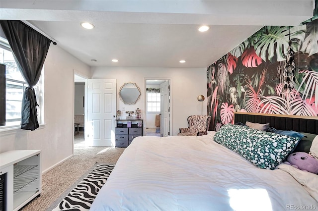 carpeted bedroom featuring recessed lighting, baseboards, and ensuite bathroom