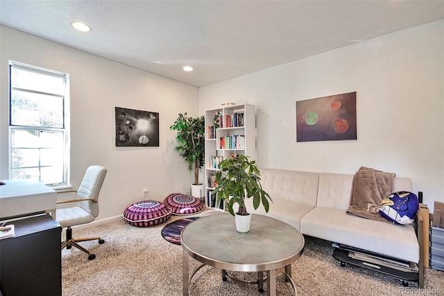 living room featuring carpet floors, a desk, and recessed lighting
