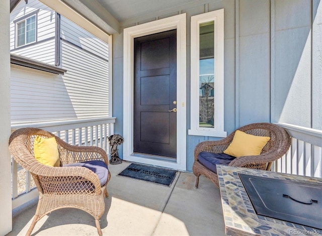 property entrance featuring covered porch