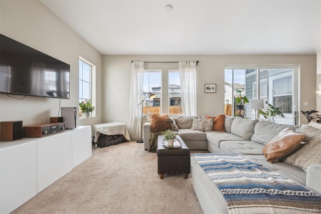 living area with light carpet