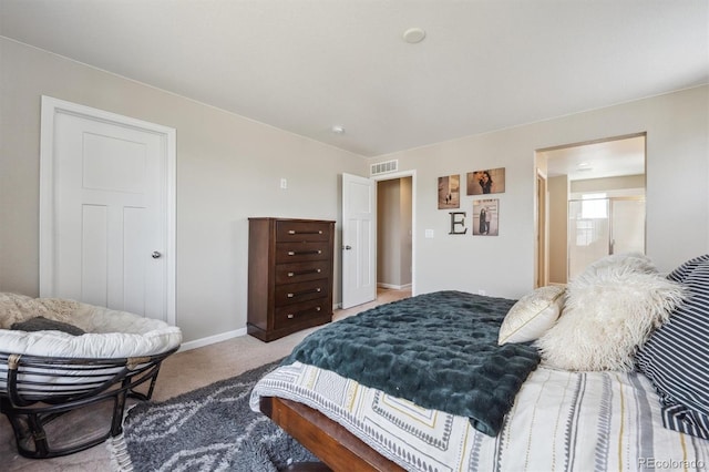 carpeted bedroom with visible vents and baseboards