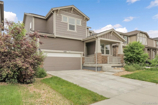 6484 N Ceylon Ct, Denver, CO 80249 - craftsman-style house with a porch, board and batten siding, driveway, an attached garage, and stone siding