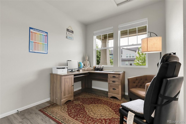 6484 N Ceylon Ct, Denver, CO 80249 - home office featuring wood finished floors and baseboards