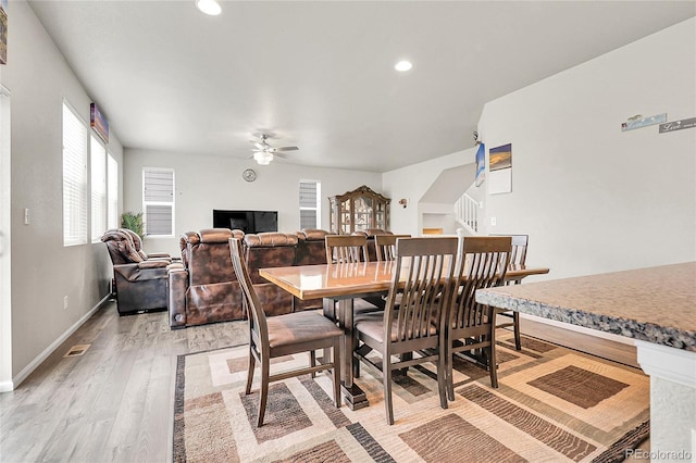 6484 N Ceylon Ct, Denver, CO 80249 - dining space featuring ceiling fan, light wood-style floors, recessed lighting, baseboards, and stairway
