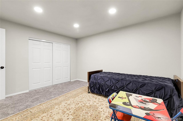 6484 N Ceylon Ct, Denver, CO 80249 - bedroom featuring carpet, recessed lighting, baseboards, and a closet
