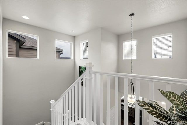 6484 N Ceylon Ct, Denver, CO 80249 - staircase featuring healthy amount of natural light and recessed lighting