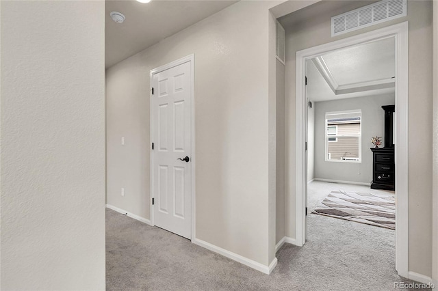 6484 N Ceylon Ct, Denver, CO 80249 - hallway with carpet flooring and baseboards
