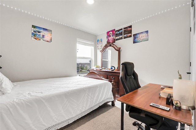 6484 N Ceylon Ct, Denver, CO 80249 - carpeted bedroom with an office area