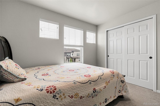 6484 N Ceylon Ct, Denver, CO 80249 - bedroom with carpet flooring and a closet