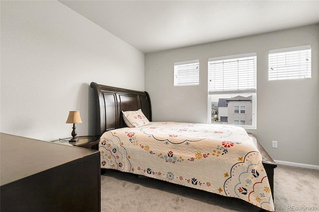 6484 N Ceylon Ct, Denver, CO 80249 - carpeted bedroom with baseboards