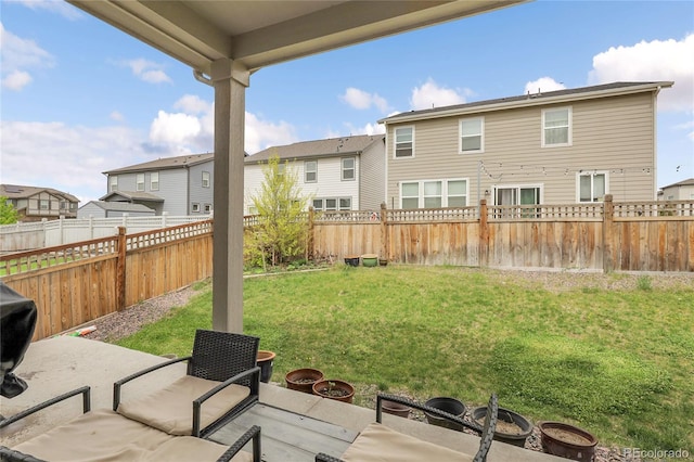 6484 N Ceylon Ct, Denver, CO 80249 - view of yard featuring a residential view and a patio
