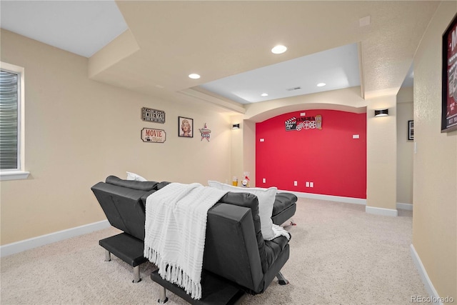 home theater room featuring carpet flooring